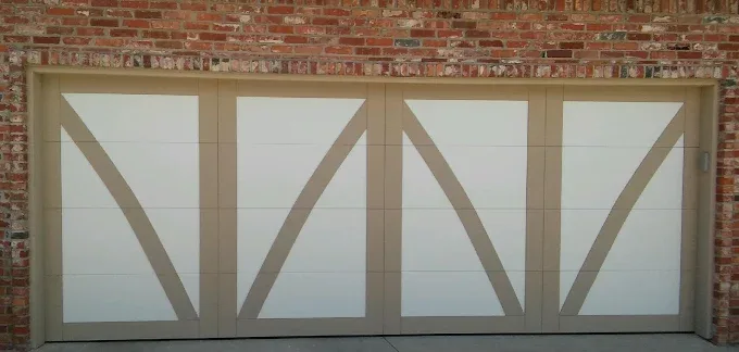 Custom contemporary geometric design garage door on brick home by Affordable Door Co OKC